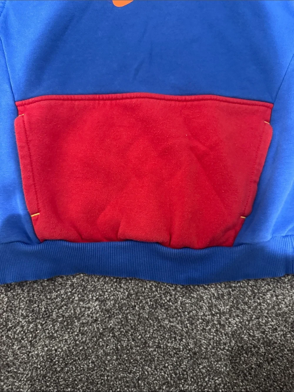 Nike Blue Hoodie with Red Pocket and Multicolor Chest Logo
